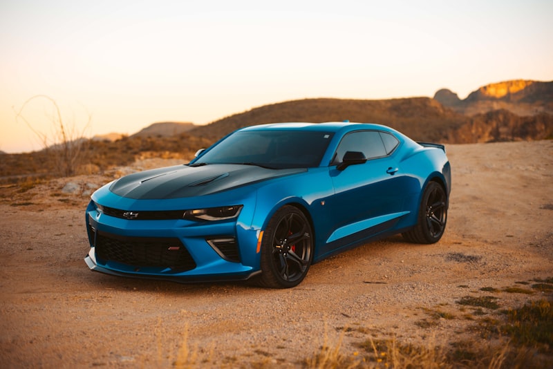 A car parked on a plain studio background.
